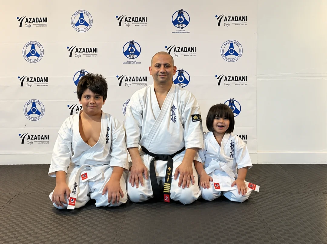 Shihan Seyar Azadani teaching two young students at Azadani Dojo