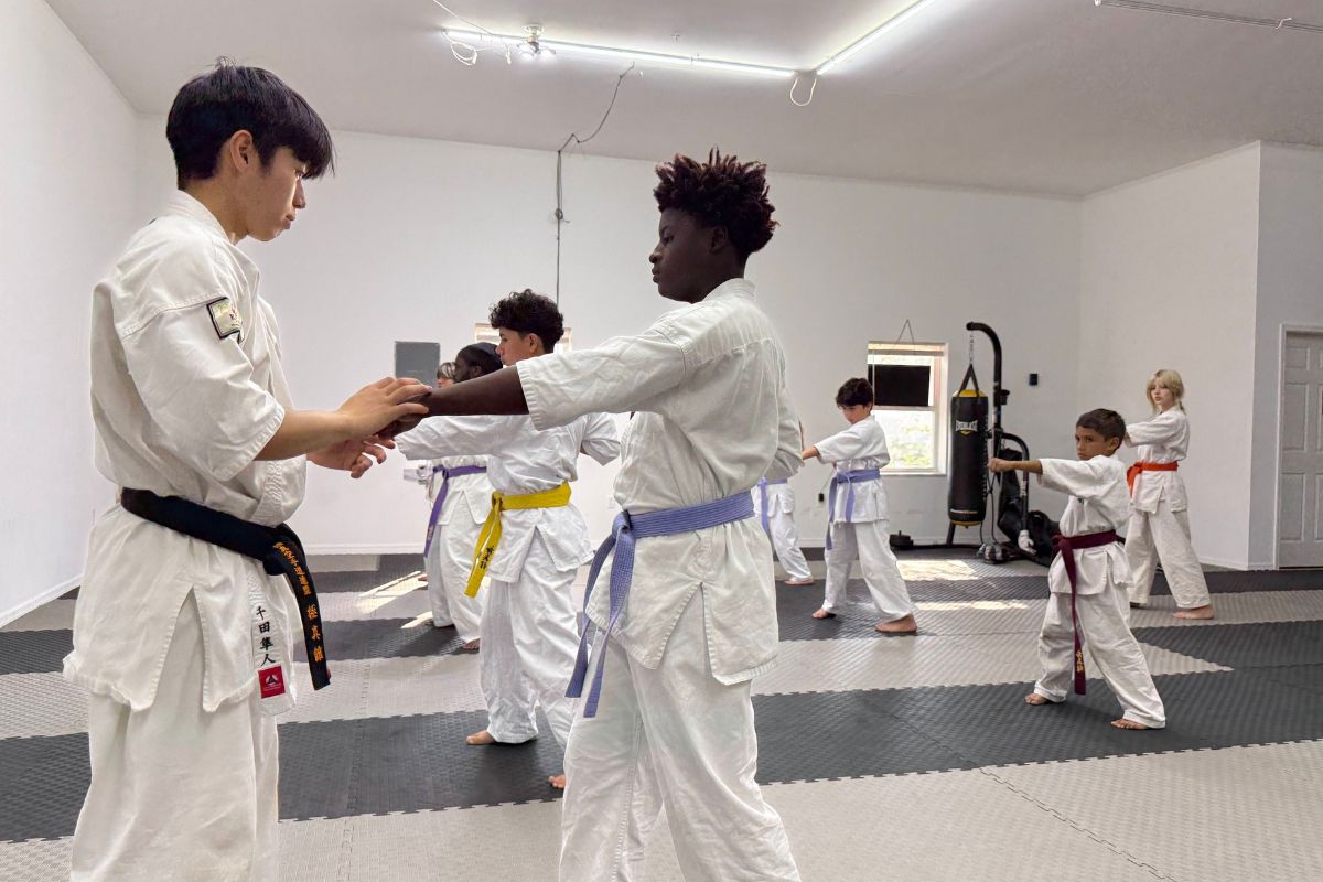 Students practicing partner technique